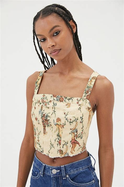 You’ll have everyone lovestruck in this versatile <b>corset</b> by Out From Under. . Urban oitfitters corset top